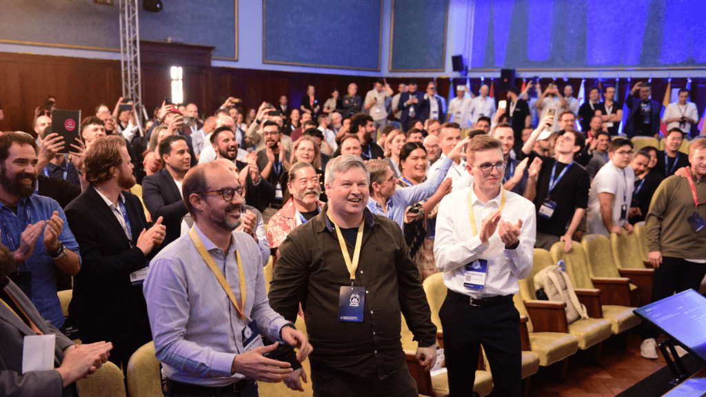 community event attendees clapping