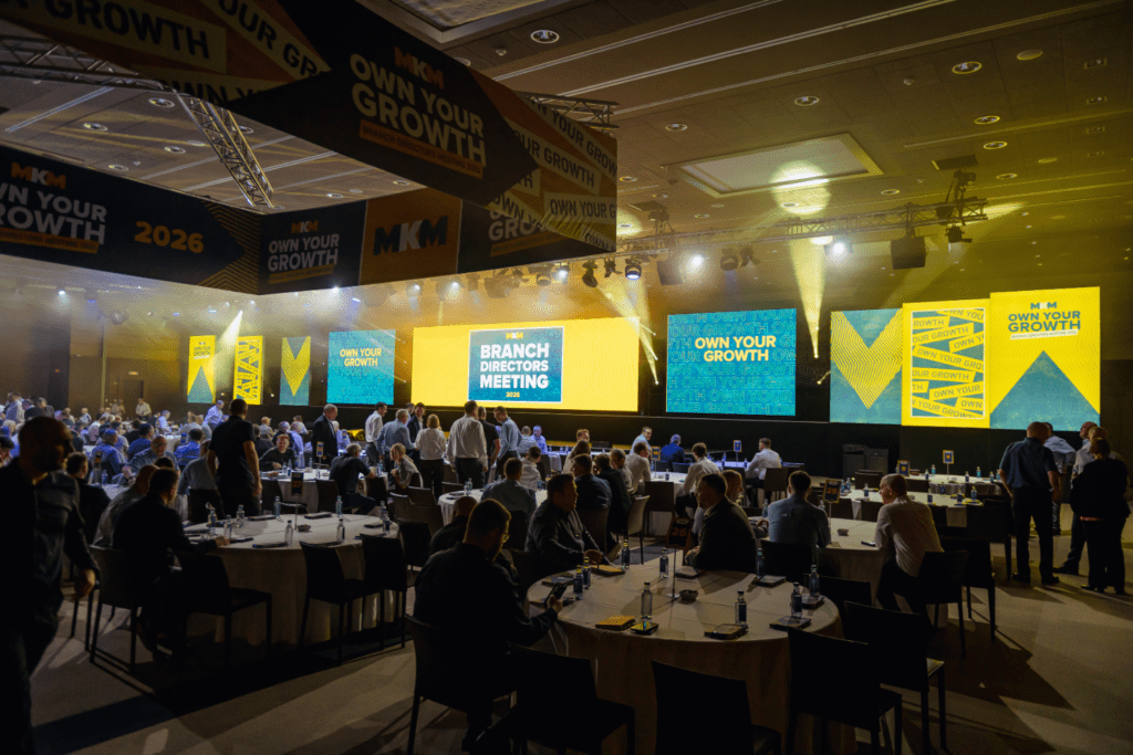 Strategic immersive leadership conference delivered by event agency with bold stage design, keynote speakers gala awards dinner.