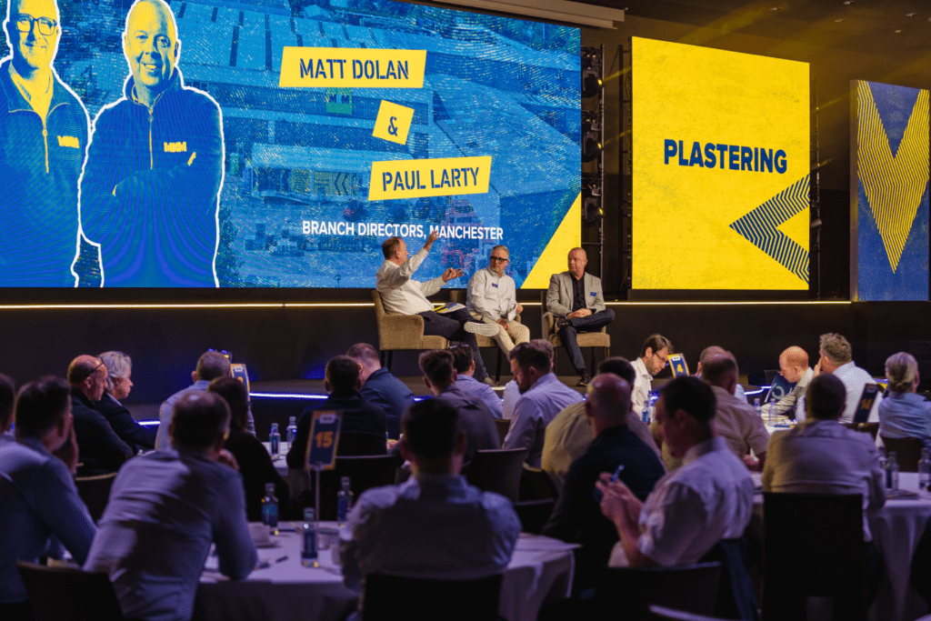 Strategic immersive leadership conference delivered by event agency with bold stage design, keynote speakers gala awards dinner.