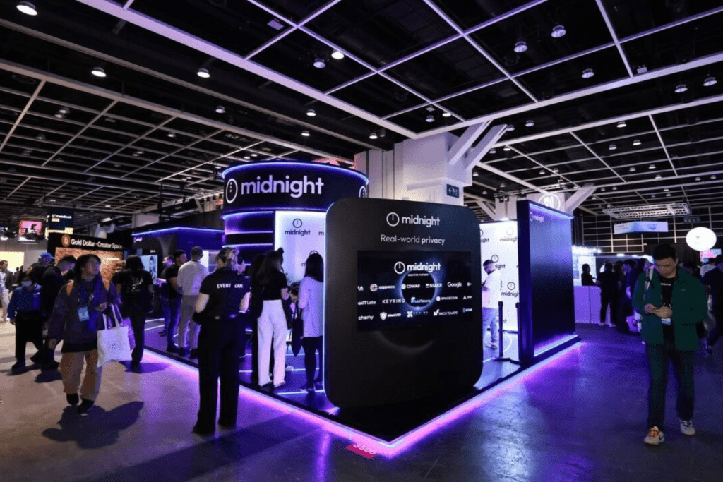 Bespoke exhibition stand with lighting and digital displays creating immersive brand experience by creative event agency